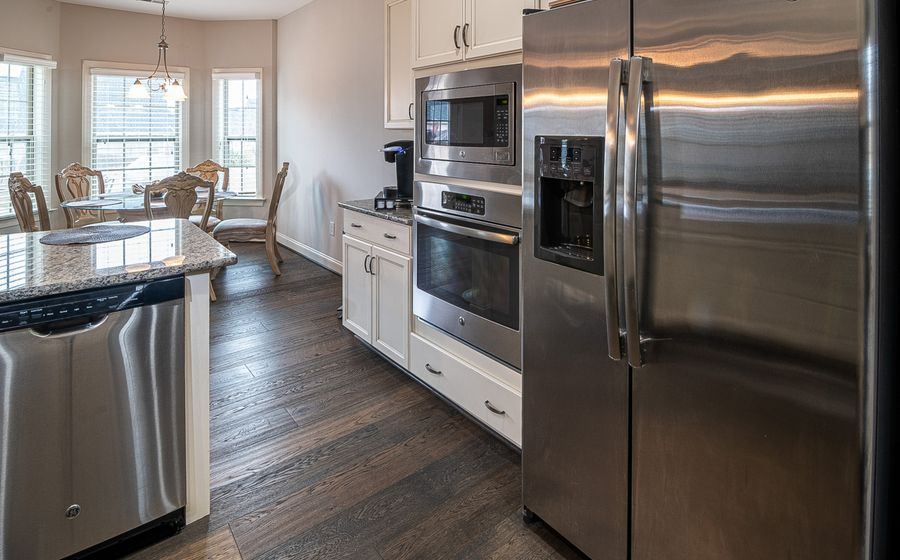 Commercial kitchen appliances on a retail showroom floor