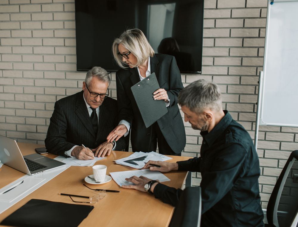 Procurement team reviewing a quotation