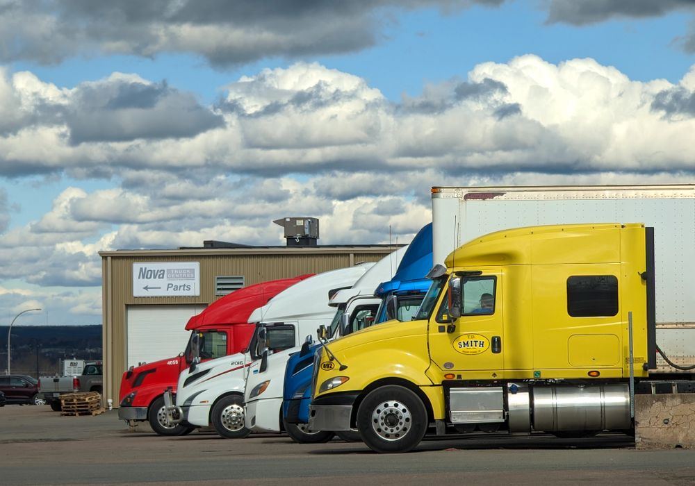 Delivery fleet staged outside a distribution facility